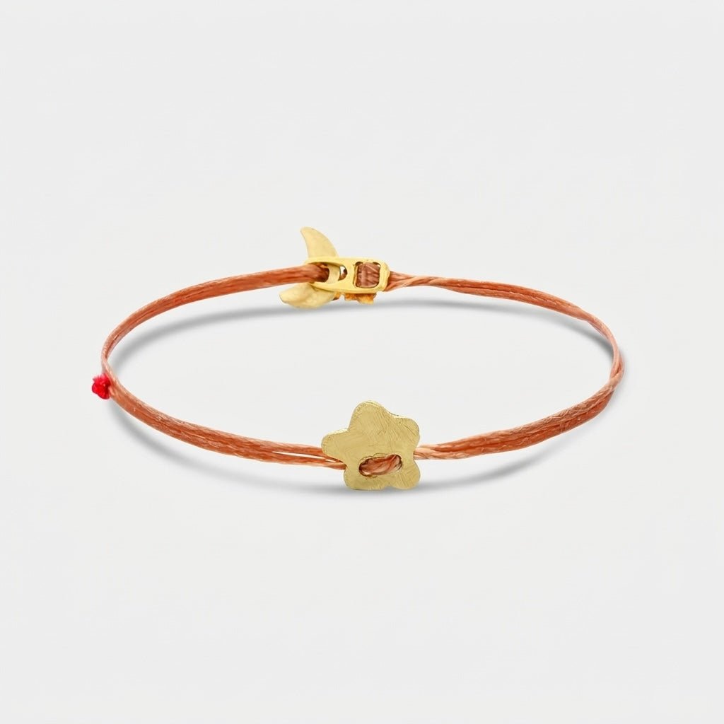 14K Gold Clover Bracelet featuring a solid 14K gold charm and bench-made clasp