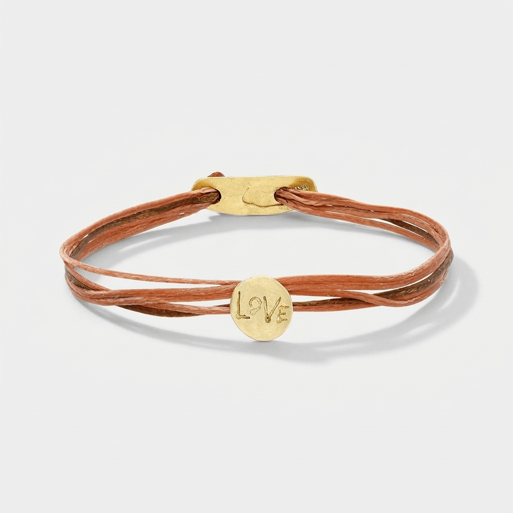 14K Gold Love Bracelet featuring a hand-etched solid 14K gold charm and bench-made clasp.